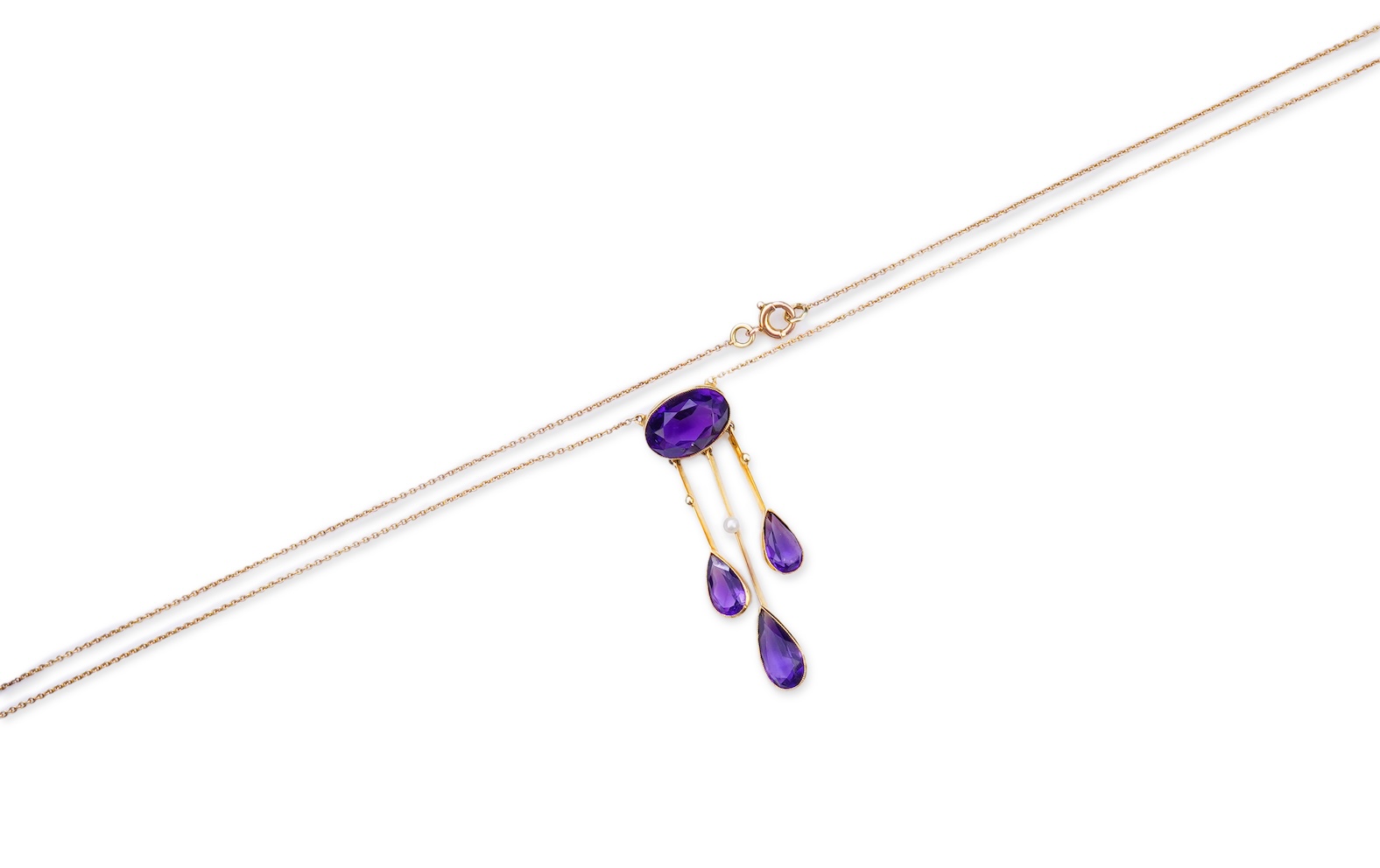 An Edwardian amethyst and seed pearl pendant, circa 1910